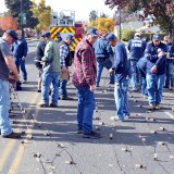 Volunteer firemen and friends prepare the lights for the new tree.